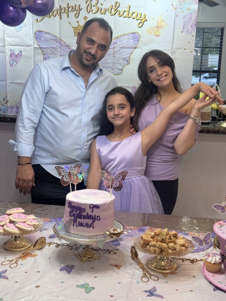 Ibrahim, Enji, and Rawan celebrating Rawan’s 9th birthday and the first among her family in the United States